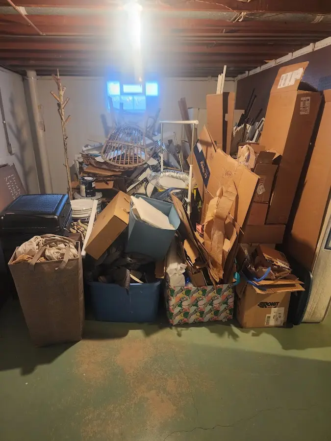 Roll-off dumpster container at job site for 20 Yard Dumpster Rental in Celina